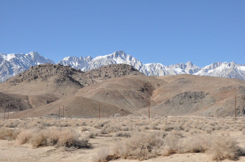 Mt.Whitney is the furthest peak on right side of photo. Alabama Hills are the brown ones in front-many movies and TV shows (Bonanza) shot here.