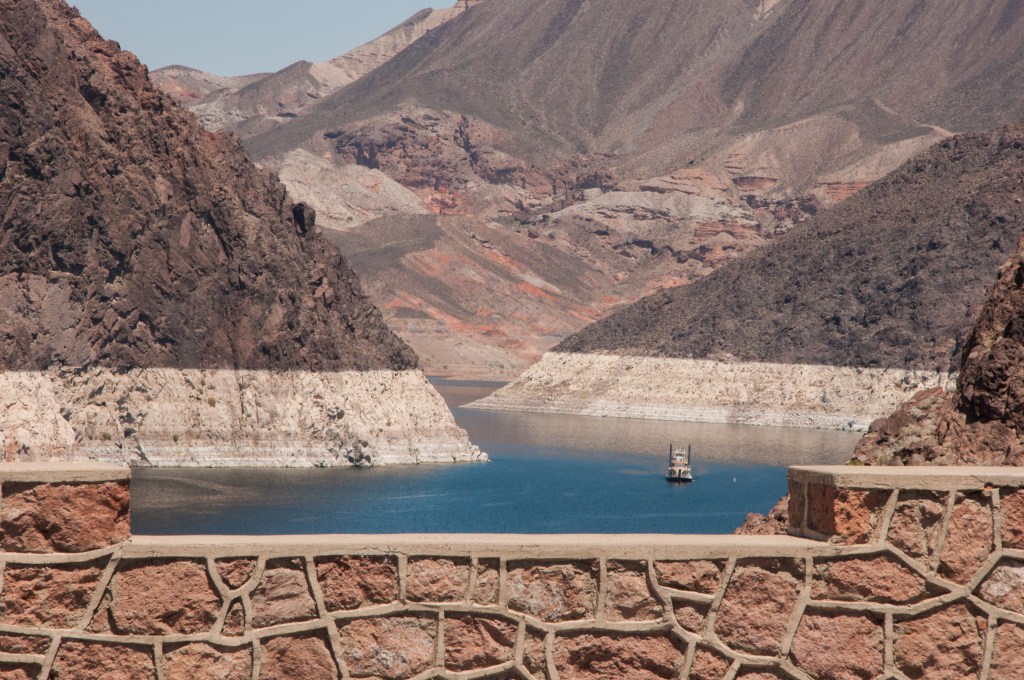Hoover in the morning, tour boats on the Colorado River.