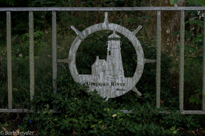The fence surrounding the property was all made of lighthouses of Oregon, all slightly different and aged differently.